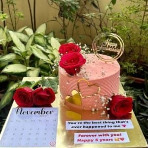 Customized birthday cake with photo toppers, red roses and golden decoration