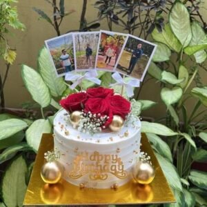 Customized birthday cake with photo toppers, red roses and golden decoration